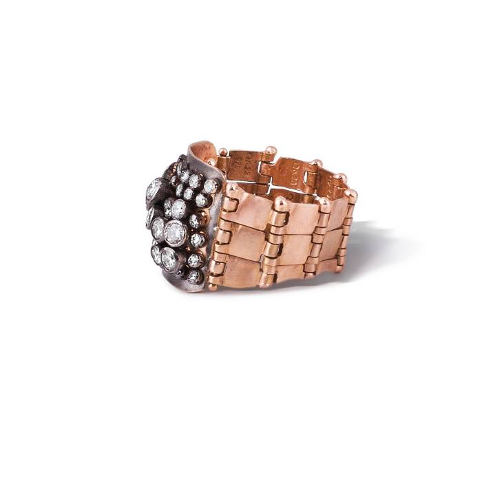 Diamond ring in 18k rose gold with fine make brilliant-cut diamonds and black platinum plated on top